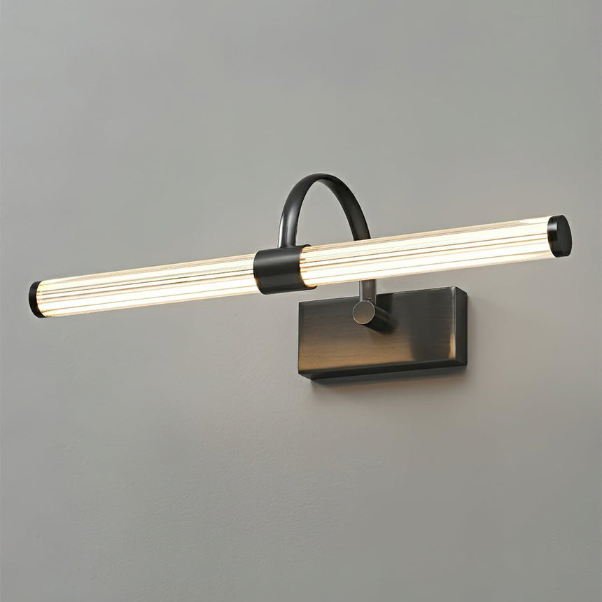 The dark version lit, the same ribbed tube under a black arch and plate