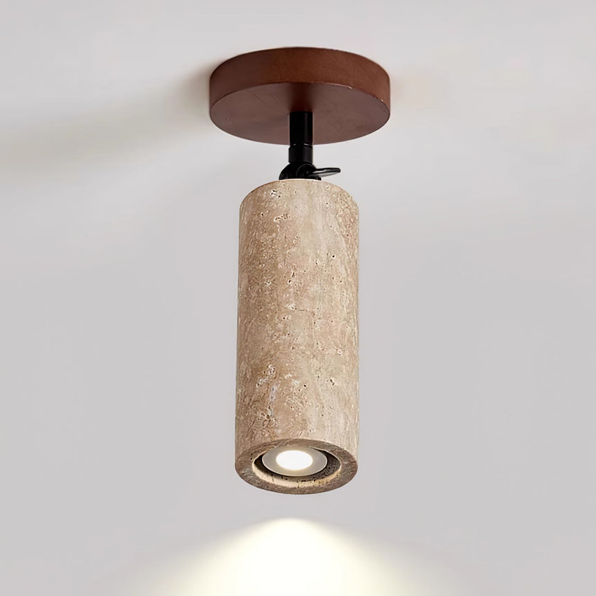 The same travertine tube mounted on a ceiling and aimed straight down