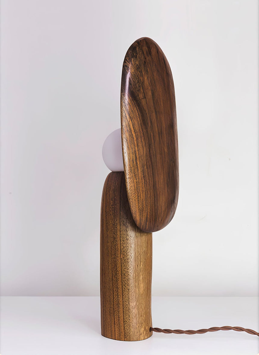 Side profile of the table lamp showing the thin backplate behind the wood body