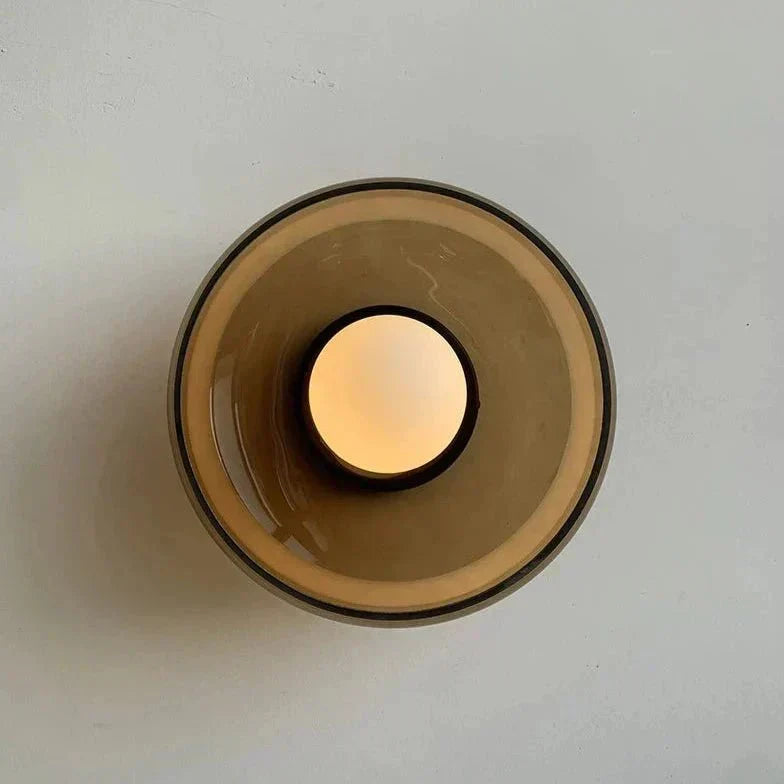 Glass wall lamp with warm LED ambient glow for living room
