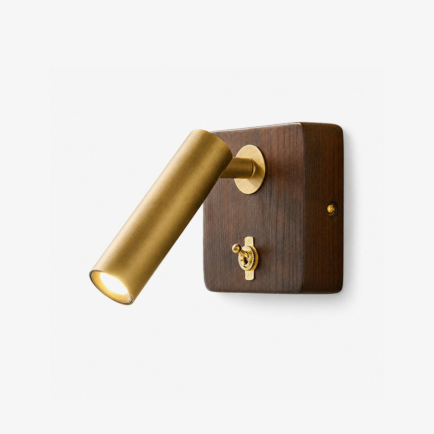 Wall lamp for reading with a brass head on a square ash wood plate