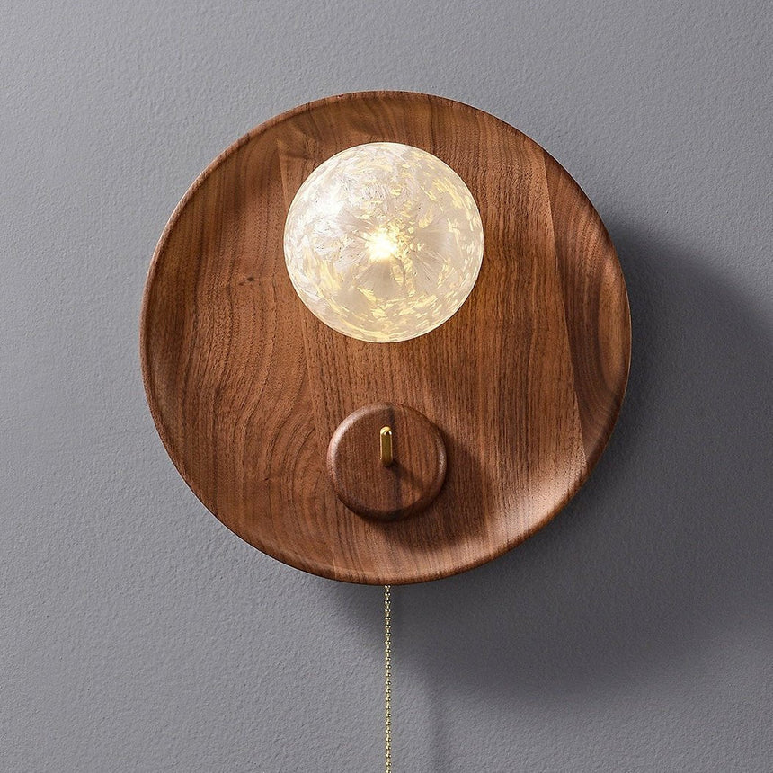 Close view of the lit globe, its crackled surface breaking up the light