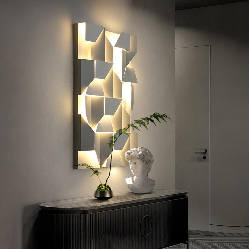 Lit above a dark sideboard holding a plaster bust beside an open doorway