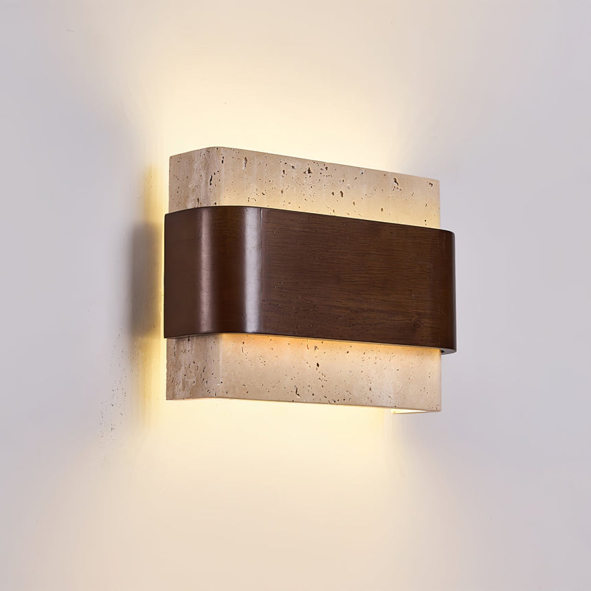 Light spilling upward and downward from the stone above the wood band