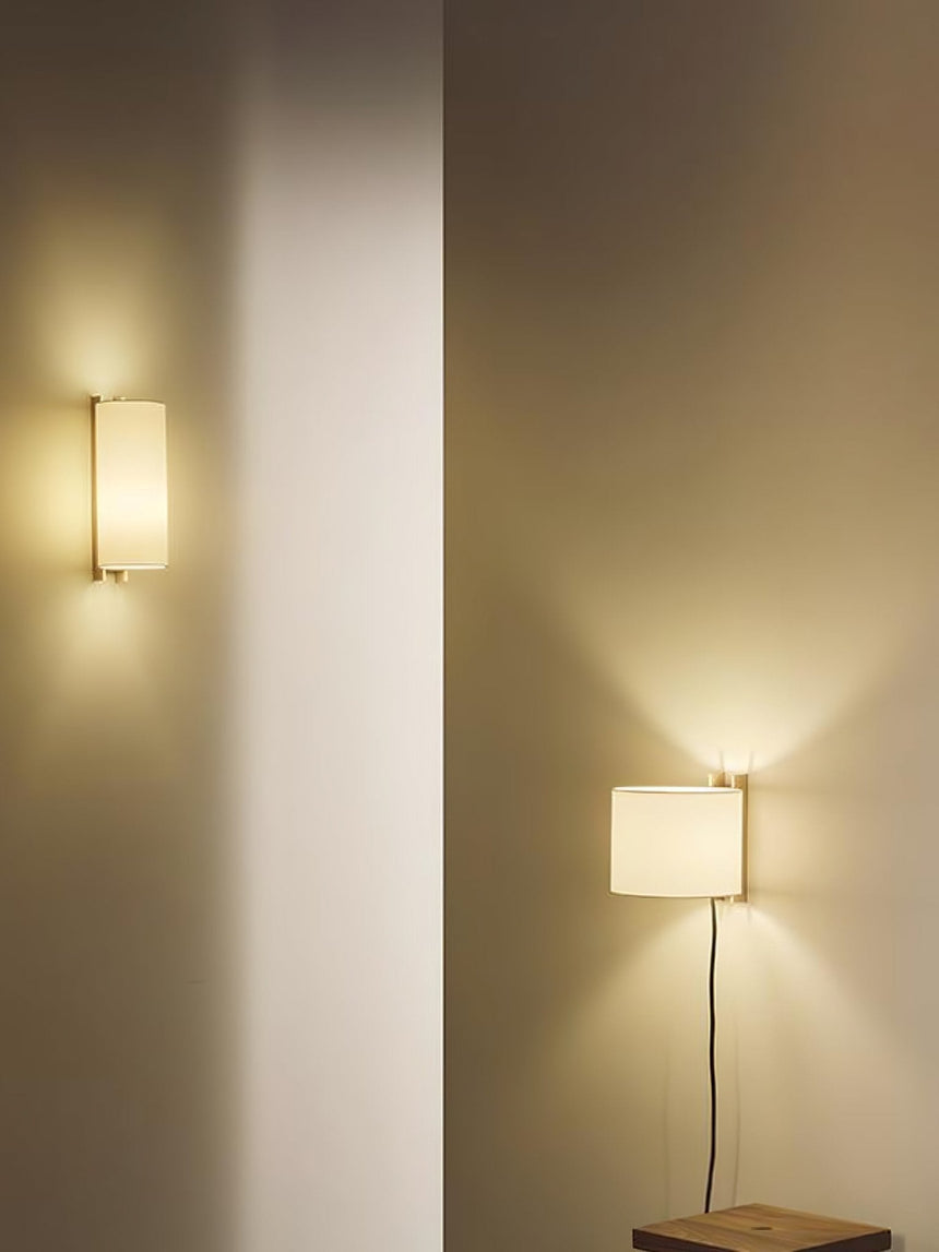 Wall sconce with a linen shade