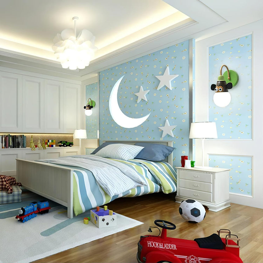 The zebra lamp on a blue wall in a kids bedroom with a single bed and a toy car