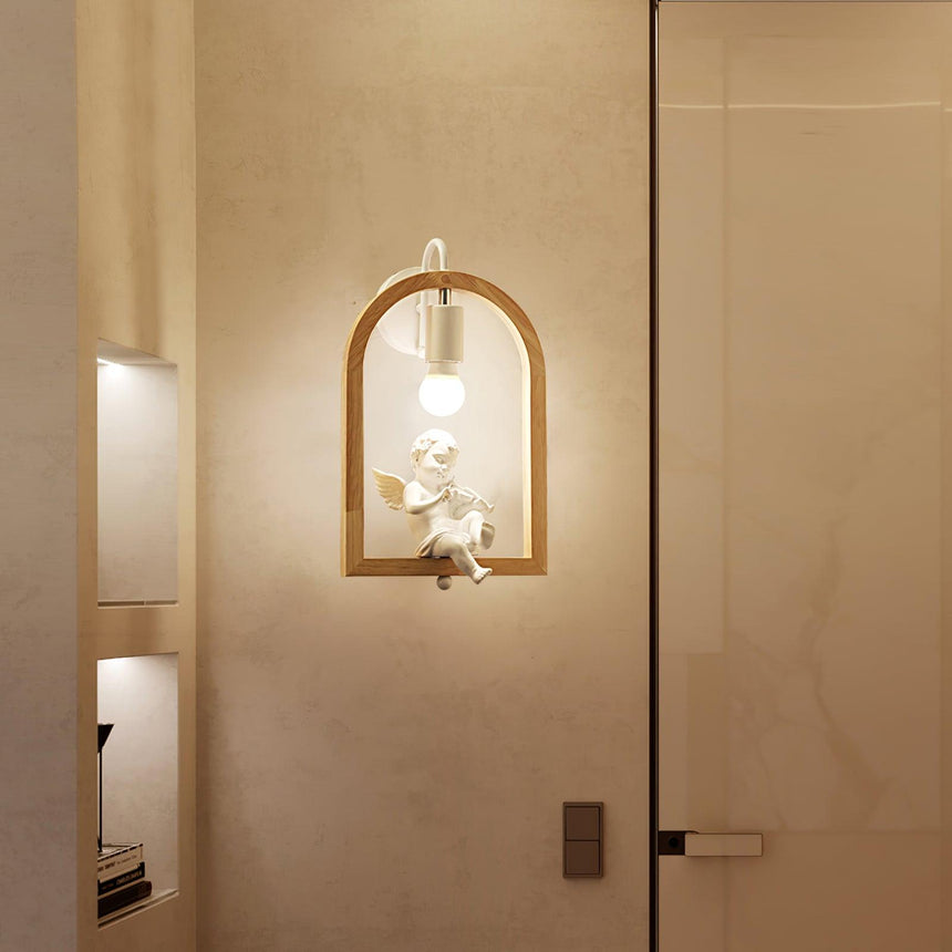 Sconce lit beside a doorway on a wall panel, light washing the plaster