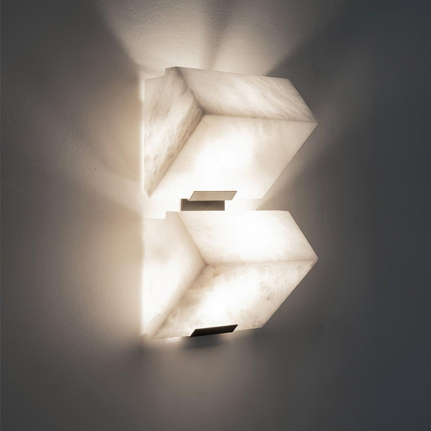 Two blocks lit on a dark ground, the glow spreading above and below