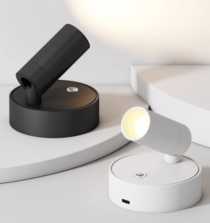 The black and white versions together, one standing and one lying on its base