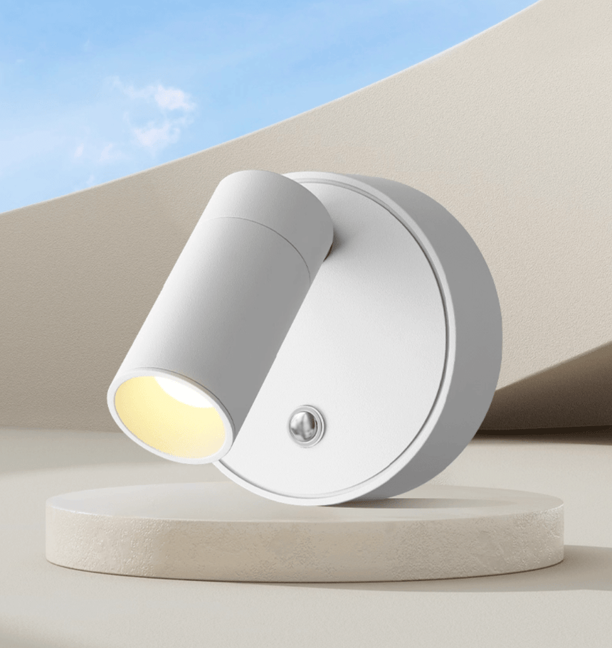 The white barrel turned out from the round base, seen on a pale plinth
