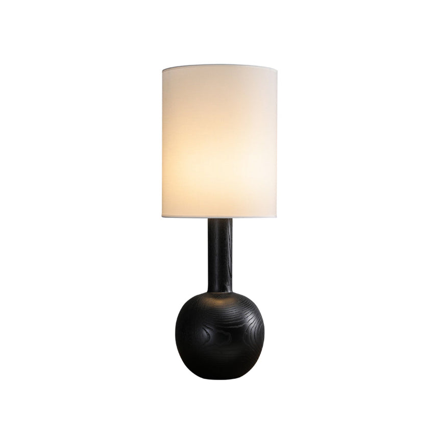The black version lit against a plain pale ground