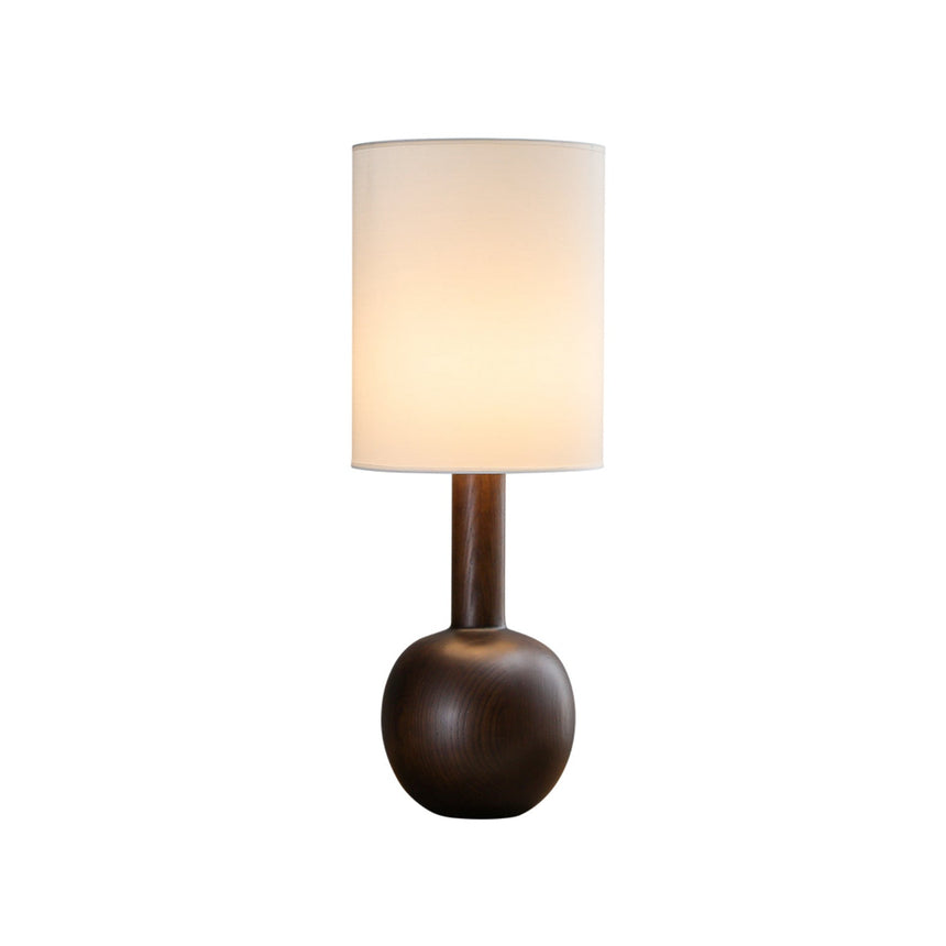 The walnut version lit against a plain pale ground