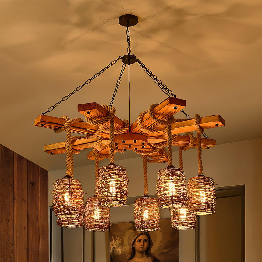 The timber beams and rope wrapping seen lit from below, shades glowing amber