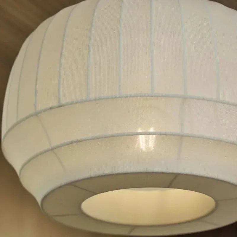 Underside of the knitted shade showing the lit opening