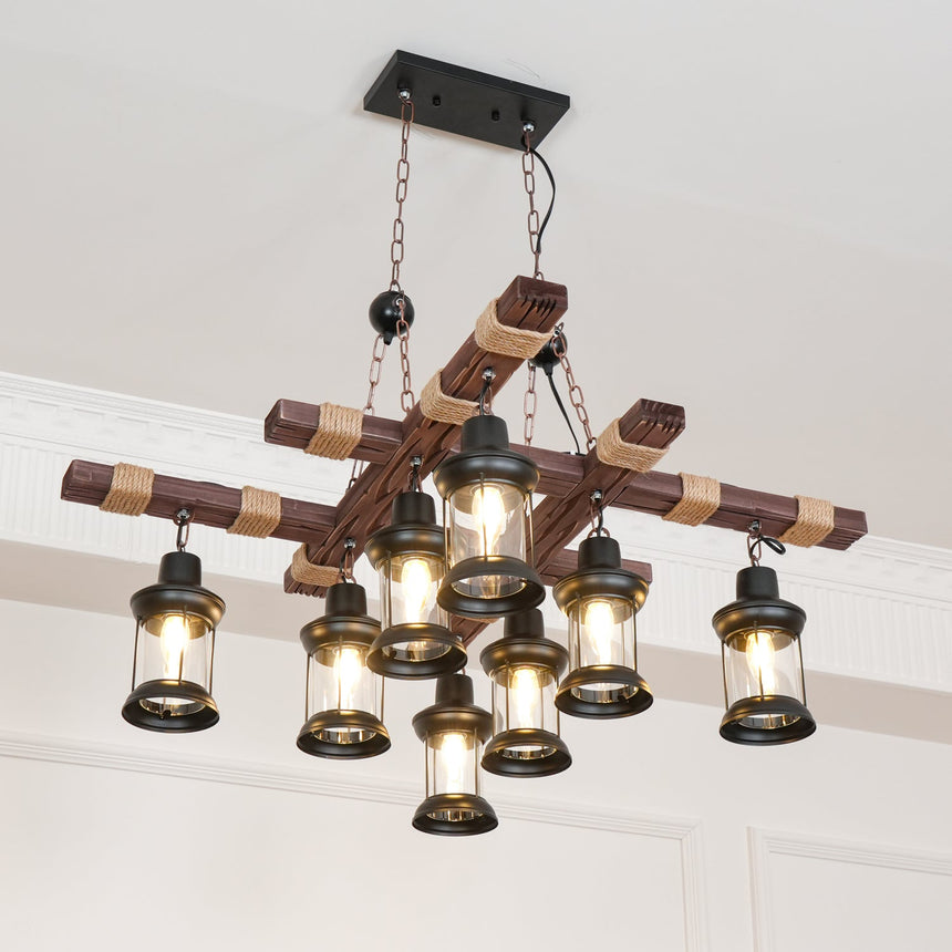Seen from below at a ceiling corner, the beams crossing above the lit lanterns