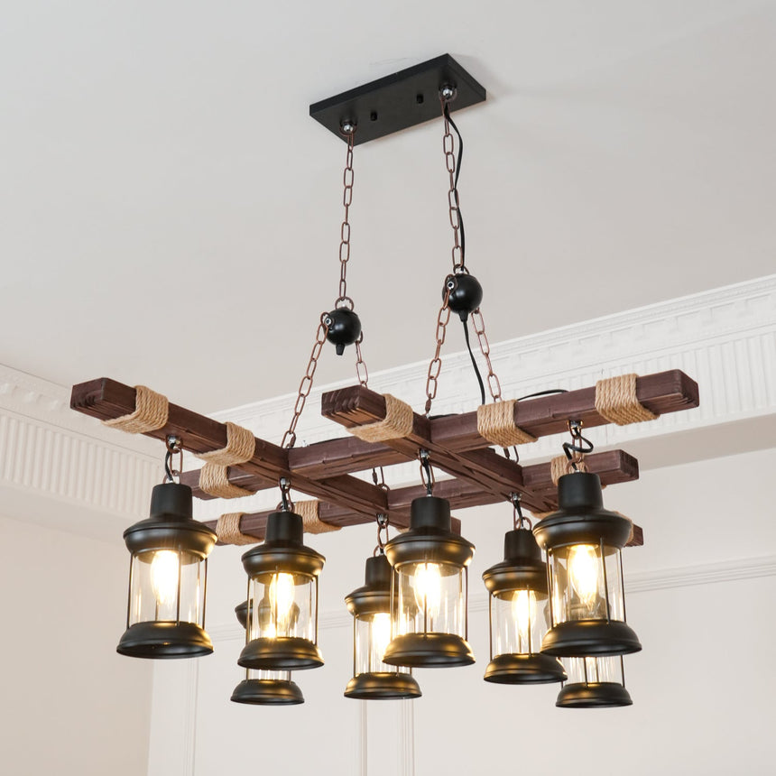 The eight lanterns lit in a pale paneled room with a framed print on the wall below