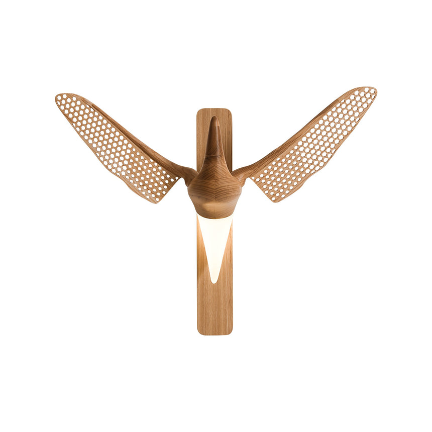 The pale wood version with both wings spread and the diffuser lit