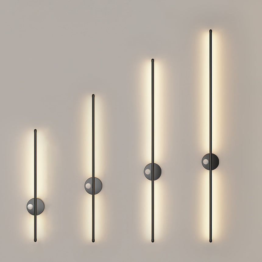 The four lengths lit in a row, each rod taller than the one beside it