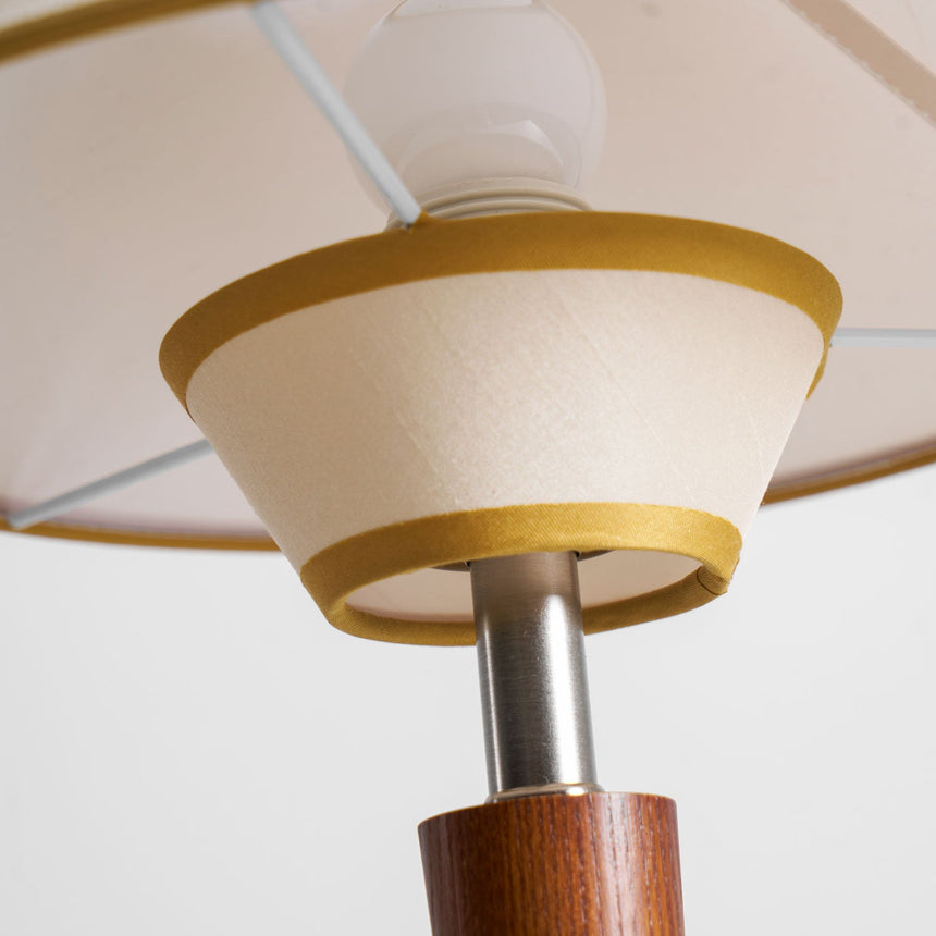 Underside of the shade showing the bulb and the inner tier