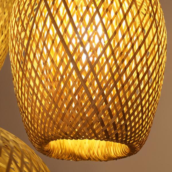 The crossed bamboo strands seen close, lit from within so the weave glows