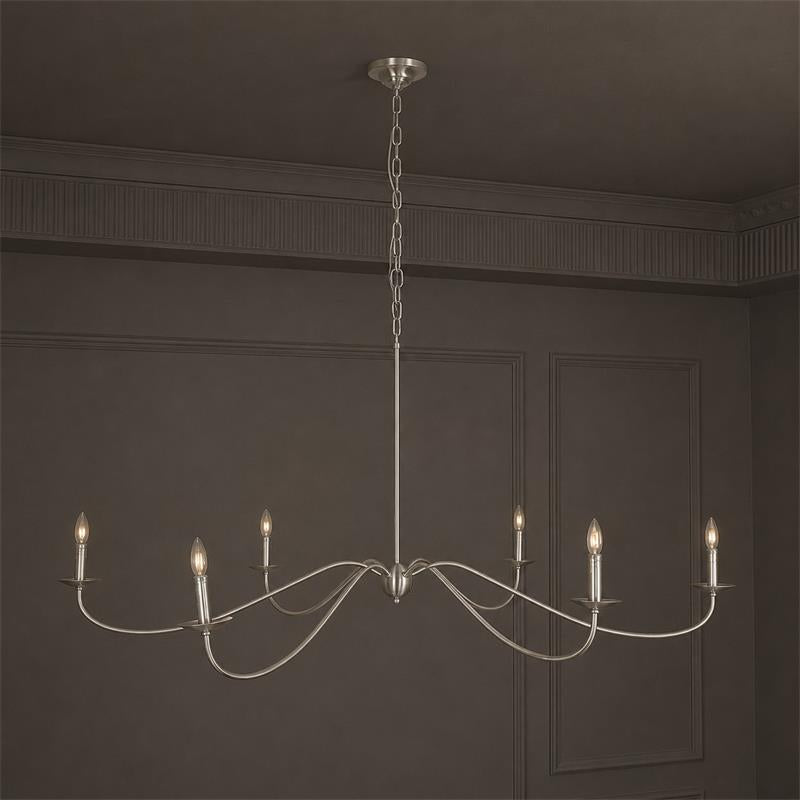 The satin nickel version against a dark wall, arms curving from the hub
