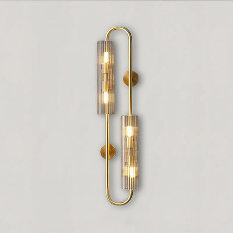 Brass wall lamp LED for living room with bent brass tubes and clear cylindrical glass shades warm ambient glow