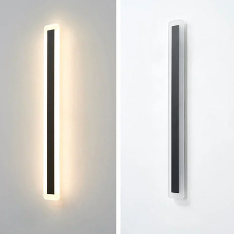 Warm white LED outdoor wall strip light mounted on a covered patio wall with a welcoming glow