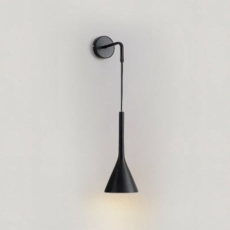 Nordic lantern wall sconce LED with warm white glow mounted in a cozy Scandinavian bedroom