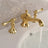 Widespread bathroom faucet with three-hole sink installation