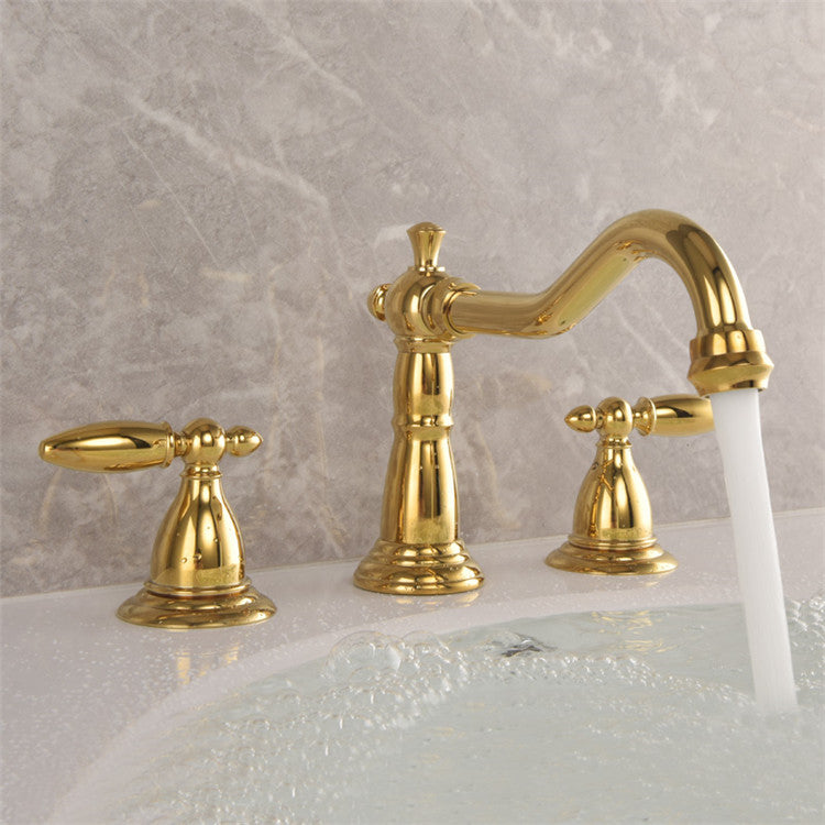 Vintage brass double-handle bathroom faucet with three-hole sink installation
