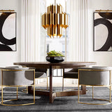 Gold Pendant Light Installed Above Dining Table