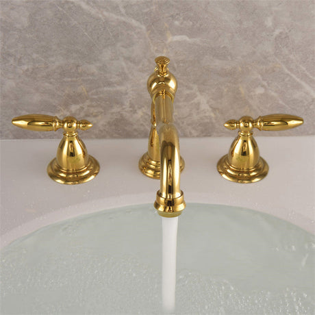 Vintage brass double-handle bathroom faucet installed in a bathroom setting