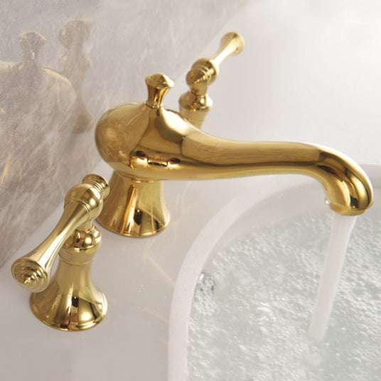 Widespread bathroom faucet close-up view - three-hole sink installation
