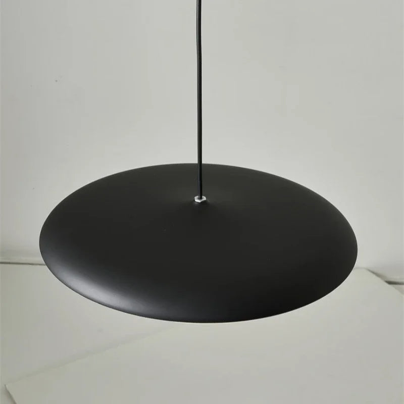 Minimalist Industrial-Chic Round Pendant Light with Warm LED Glow | OroDwell