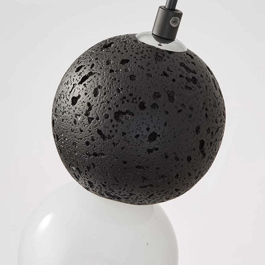 Sleek glass pendant light for living room accent