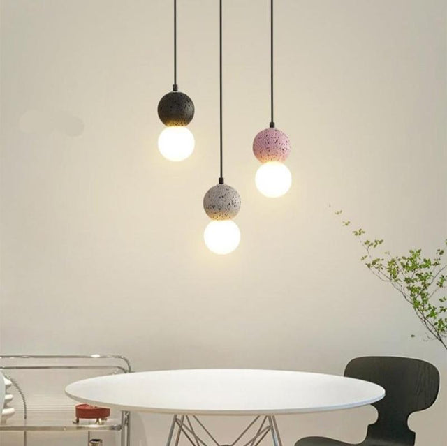 Glass LED pendant light with sleek modern silhouette