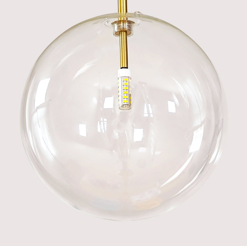 Gold glass pendant light with sphere shade for kitchen