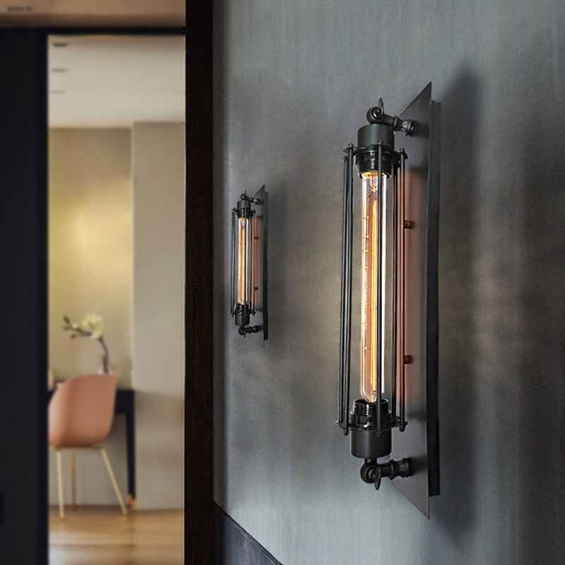 Black Cylinder Wall Lamp Mounted on Wall Setting