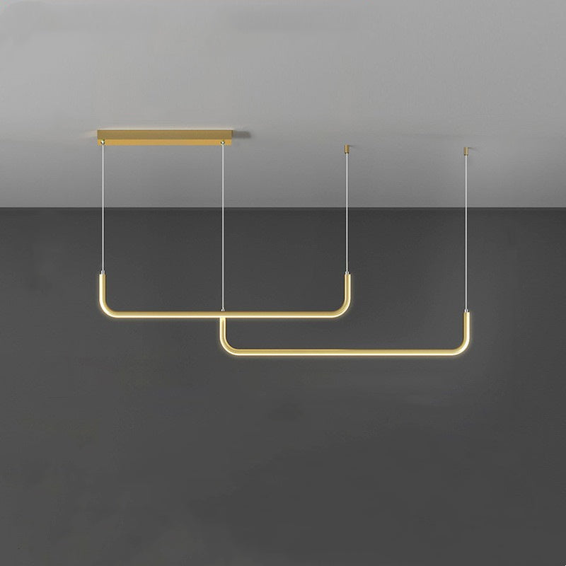Metal and silicone pendant light with LED source