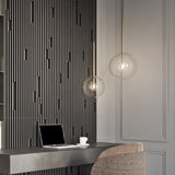 Brass finish pendant light with clear glass shade