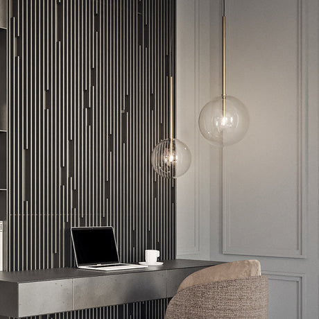 Brass finish pendant light with clear glass shade