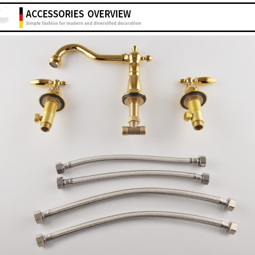 Vintage brass double-handle bathroom faucet close-up view - three-hole sink installation