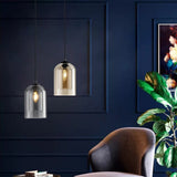 Glass pendant light with sleek modern silhouette