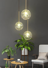 Sphere pendant light for cozy kitchen ambiance