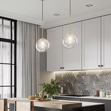 G4 bulb pendant light with polished brass finish