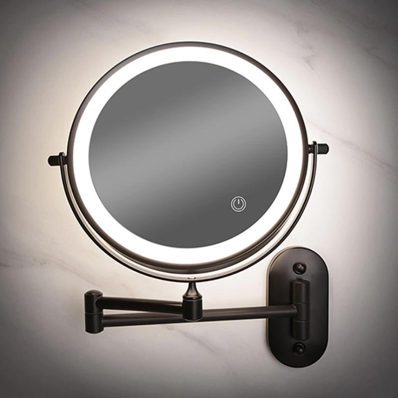 Black LED magnifying vanity mirror mounted on bathroom wall