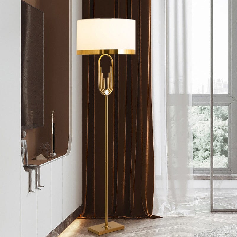 Art deco floor lamp in gold finish