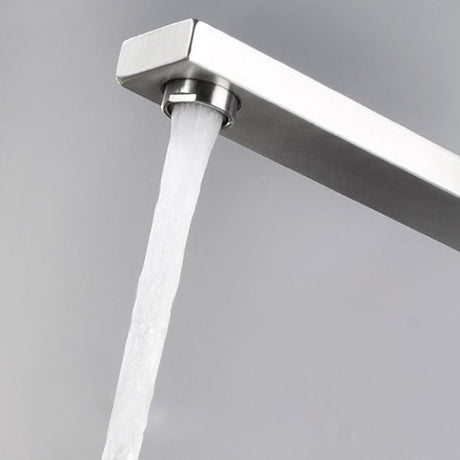 Stainless steel kitchen faucet installed in a kitchen setting - brass chrome plating finish