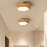 Wood accent LED ceiling light with sleek modern silhouette