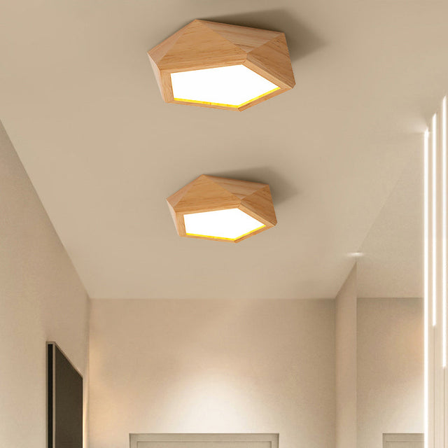Wood accent LED ceiling light with sleek modern silhouette